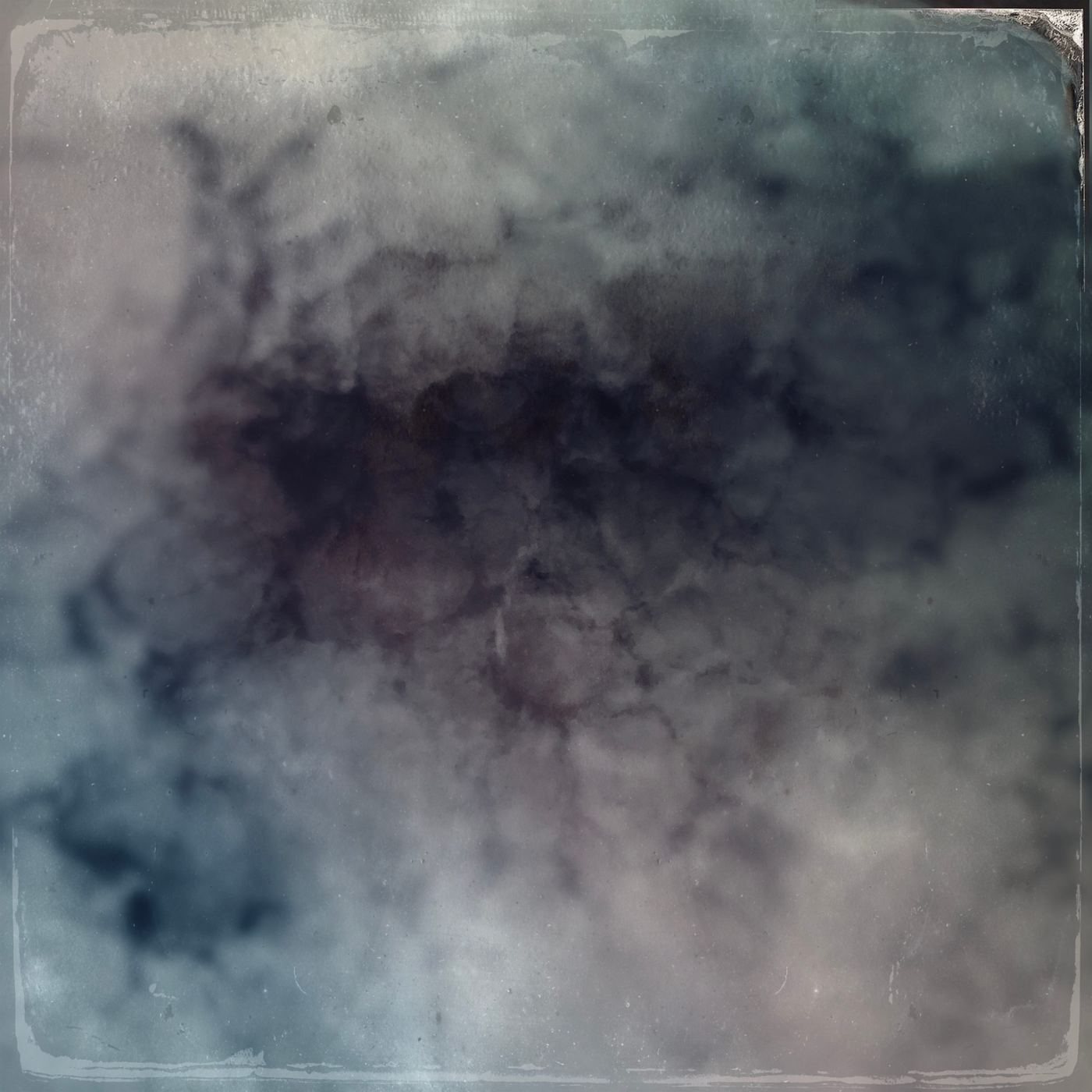 A cloudy stain of grey and violet