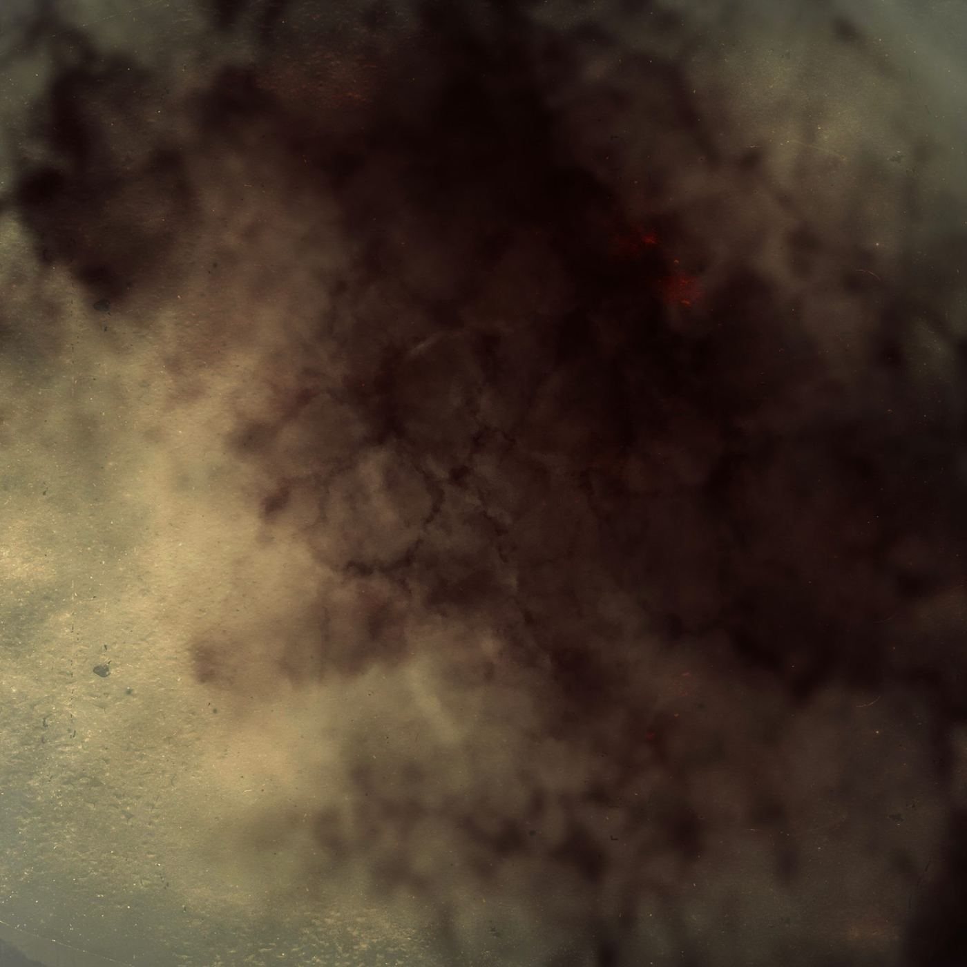 Dark brown and gold, mottled like smoke